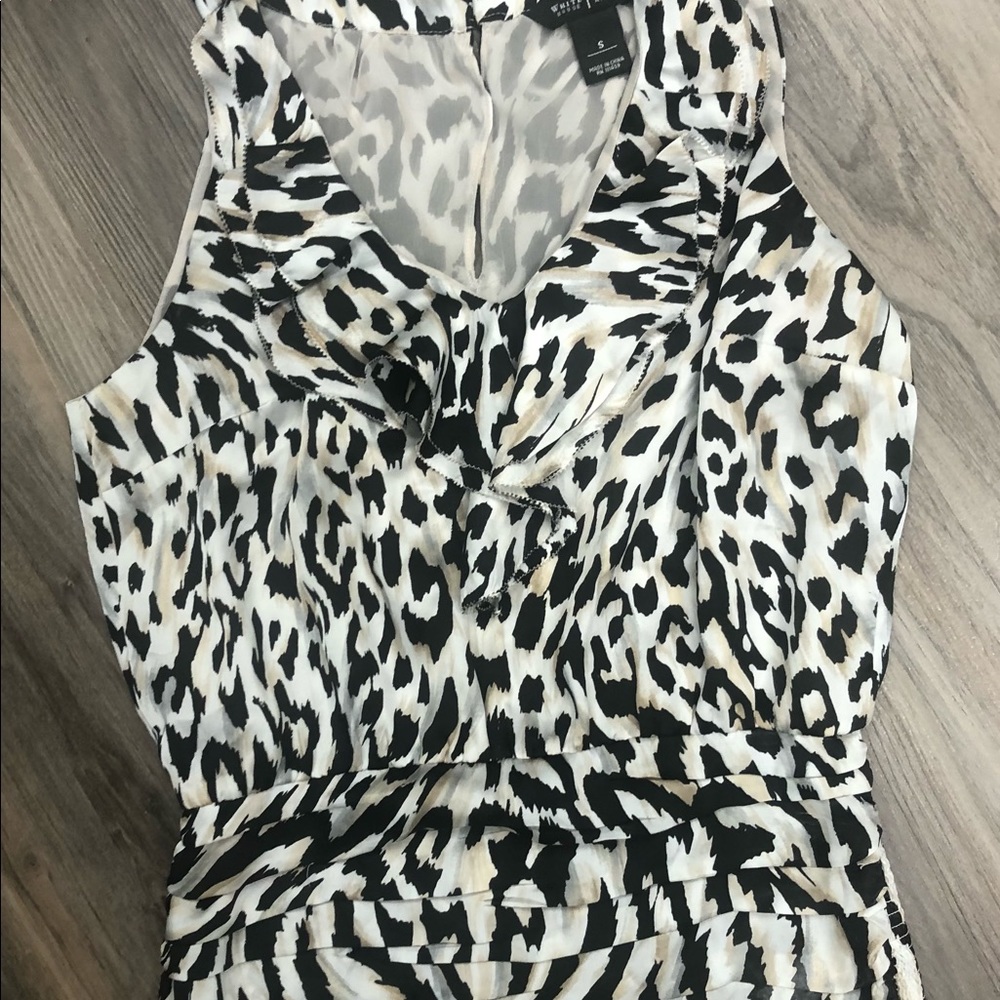 Animal print rouched and silky blouse.